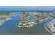 Stunning waterfront home on the lake with a private boat dock and lush tropical landscaping at 5405 Merritt Island Dr, Apollo Beach, FL 33572