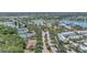 Aerial view of the community featuring lakes, tennis courts, and homes at 5405 Merritt Island Dr, Apollo Beach, FL 33572