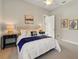 Inviting bedroom with a cozy bed, decorative pillows, and stylish bedside tables at 5405 Merritt Island Dr, Apollo Beach, FL 33572