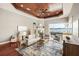 Bright living room with wood ceiling, fireplace and beautiful water view at 5405 Merritt Island Dr, Apollo Beach, FL 33572