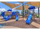 Community playground featuring slides, and covered play areas, perfect for Gathering fun at 5405 Merritt Island Dr, Apollo Beach, FL 33572