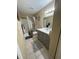 Bathroom showcasing decorative shower curtain and grey vanity at 8653 Fancy Finch Dr # 102, Tampa, FL 33614