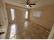 Comfortable bedroom with tile flooring, large windows, and plenty of natural light at 89 Mark Twain Ln, Rotonda West, FL 33947