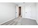 Bedroom with neutral walls and carpet, showcasing white doors and trim at 7270 Deer Valley Cir, Tampa, FL 33635