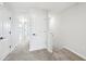Bright upstairs hallway with neutral carpet and paint at 7270 Deer Valley Cir, Tampa, FL 33635