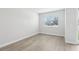 Clean bedroom featuring a large window, and hard surface flooring at 7272 Deer Valley Circle, Tampa, FL 33635