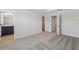 Spacious bedroom with gray carpet, white walls, ensuite bathroom, and walk-in closet at 7274 Deer Valley Cir, Tampa, FL 33635