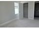 Bedroom featuring closet and bathroom doorways at 7284 Deer Valley Cir, Tampa, FL 33635
