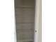 Walk-in closet featuring white wire shelving for optimal storage at 7284 Deer Valley Cir, Tampa, FL 33635