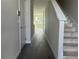 Entryway featuring tiled floors and stairs leading to the second floor at 7284 Deer Valley Cir, Tampa, FL 33635