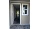 Inviting entryway featuring an open doorway with a view of the home's interior at 7284 Deer Valley Cir, Tampa, FL 33635