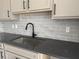 Close-up of a kitchen sink and faucet at 7284 Deer Valley Cir, Tampa, FL 33635