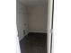 Functional laundry room boasts tile flooring, utility connections, and storage options, perfect for efficient chore management at 7284 Deer Valley Cir, Tampa, FL 33635