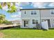 Exterior backyard of the home showcasing the grass at 7294 Deer Valley Cir, Tampa, FL 33635