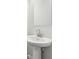Close up view of the bathroom sink and mirror at 7294 Deer Valley Cir, Tampa, FL 33635