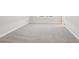 Spacious carpeted bedroom with natural light and neutral paint color at 7294 Deer Valley Cir, Tampa, FL 33635