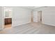 Carpeted bedroom featuring a view into the bathroom and another closet at 7294 Deer Valley Cir, Tampa, FL 33635