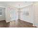 Bright dining area with wood-look floors and sliding glass doors at 7294 Deer Valley Cir, Tampa, FL 33635