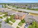 Aerial view of a beautiful community showcasing well-kept homes and scenic surroundings at 10607 Standing Stone Drive, Wimauma, FL 33598