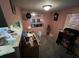 Cozy office space featuring a desk with a laptop, decor, and lots of natural light at 12485 Land St, Largo, FL 33773