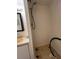 Shower area in a small bathroom with simple fixtures and a bright white shower head at 12485 Land St, Largo, FL 33773
