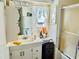 Functional bathroom with a vanity, mirror, toilet, and shower at 9790 66Th N St # 238, Pinellas Park, FL 33782