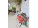 Inviting entryway with a cozy bench, steps leading up to the entrance, and views of lush greenery at 9790 66Th N St # 238, Pinellas Park, FL 33782