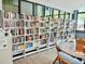 Well-stocked library with floor-to-ceiling bookshelves and a table with chairs in a bright, inviting space at 9790 66Th N St # 238, Pinellas Park, FL 33782