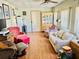 Spacious living area with a combination of modern and vintage furniture at 9790 66Th N St # 238, Pinellas Park, FL 33782