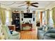 Comfortable living area featuring a sofa, arm chair and decorative wall art at 9790 66Th N St # 238, Pinellas Park, FL 33782
