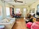 This living room is furnished with a comfortable sofa and chair seating at 9790 66Th N St # 238, Pinellas Park, FL 33782