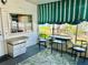 Enclosed patio area with outdoor seating and storage at 9790 66Th N St # 238, Pinellas Park, FL 33782