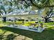 Exterior picnic area with picnic tables and covered pavilion at 9790 66Th N St # 238, Pinellas Park, FL 33782