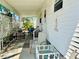 Inviting porch with comfortable seating, showcasing outdoor living space with tropical vibe at 9790 66Th N St # 238, Pinellas Park, FL 33782
