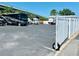 RV storage area with large vehicles, secure gate and perimeter fence at 9790 66Th N St # 238, Pinellas Park, FL 33782
