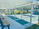 Covered shuffleboard courts with benches and greenery at 9790 66Th N St # 238, Pinellas Park, FL 33782
