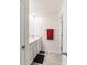 Bright bathroom featuring double sinks, granite countertops, a tiled floor, and a decorative hand towel at 3715 Capri Coast, Plant City, FL 33565