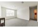 Bright bedroom with carpet flooring and a large window, providing ample natural light at 3715 Capri Coast, Plant City, FL 33565