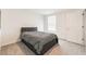 Comfortable bedroom with carpet flooring, a window for natural light, and a closet for storage at 3715 Capri Coast, Plant City, FL 33565