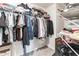 Organized walk-in closet with ample storage and hanging space for clothes and accessories at 3715 Capri Coast, Plant City, FL 33565