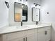 Bright bathroom boasts double vanity, quartz countertops, and stylish black hardware at 80 Sequoyah Dr, Port Charlotte, FL 33954