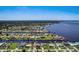 Aerial view showing waterfront homes, canals and lush greenery surrounding this beautiful community at 5202 Forbes Ter, Port Charlotte, FL 33981