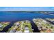 Gorgeous aerial view of the waterfront community, showcasing the canals and luxurious waterfront homes at 5202 Forbes Ter, Port Charlotte, FL 33981