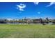 Spacious backyard leading to a canal with docks and scenic views at 5202 Forbes Ter, Port Charlotte, FL 33981