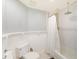 Bright bathroom features a shower and bathtub at 5202 Forbes Ter, Port Charlotte, FL 33981