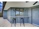 Outdoor bar area with seating, perfect for entertaining guests with a view at 5202 Forbes Ter, Port Charlotte, FL 33981