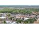 Expansive aerial view showcases the community's desirable location amidst lush greenery and convenient access to major roadways at 8614 Miramar Terrace Cir, Temple Terrace, FL 33637