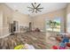Bright bonus room with wood floors, neutral color walls and recessed lighting at 16805 Tobacco Rd, Lutz, FL 33558