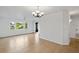 Bright living room featuring tile floors and large windows with natural light at 2486 Caring Way # 17A, Port Charlotte, FL 33952