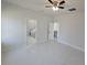 Spacious bedroom with tile floors and access to the en-suite bathroom at 3105 Lockwood St, Port Charlotte, FL 33952